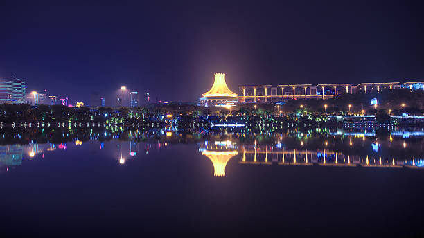 istock modern city at night, Nanning, China 466548215
