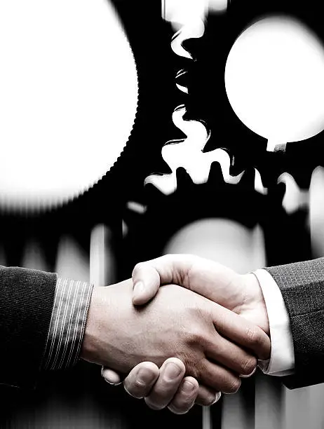 handshake with gears background