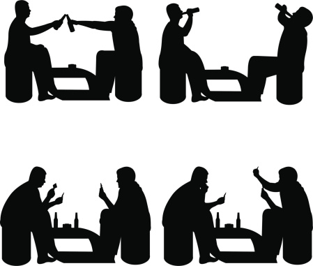 Men playing cards and drinking beer for fun silhouette