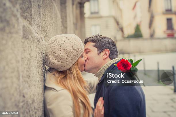 Couple With A Rose Kissing On Valentines Day Or Anniversary Stock Photo - Download Image Now