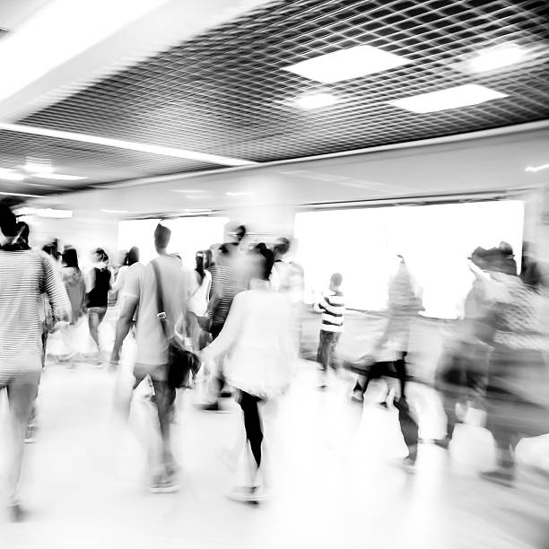 istock black and white blur passenger walk at subway station 466562155