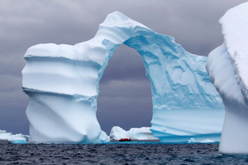 Spectacular Arch Shaped Iceberg in Antarctica