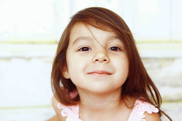 A close up image of a beautiful little girl, three years old.