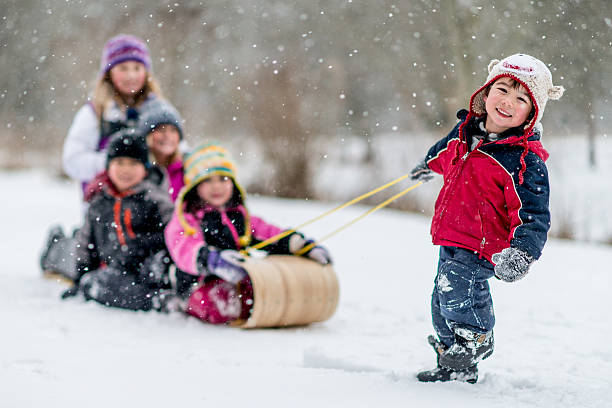 luge - child winter snow asian ethnicity photos et images de collection