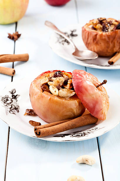 istock Baked apples with nuts and raisins 466571887