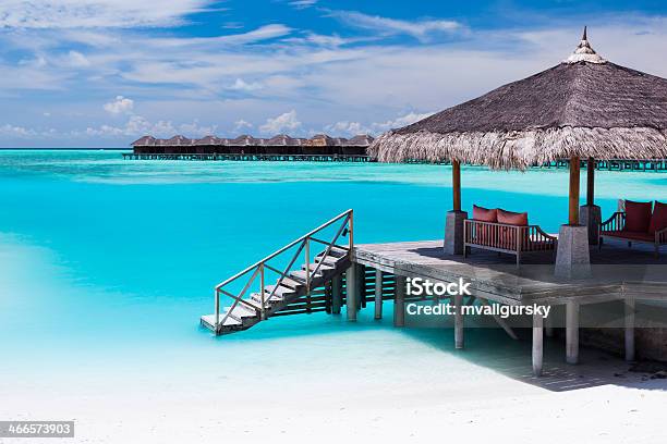 Over Water Jetty With Steps Into Tropical Lagoon Stock Photo - Download Image Now - Maldives, Luxury, Bora Bora