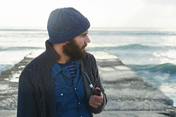 istock Young man and the sea 466574203