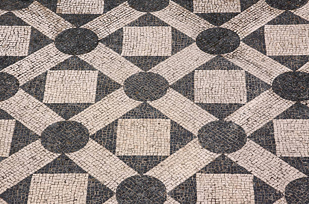 Portuguese black and white mosaic pavement. stock photo