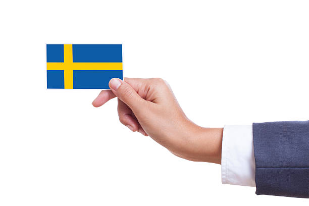 istock Businessman holding a business card with Sweden Flag with using path 466583225