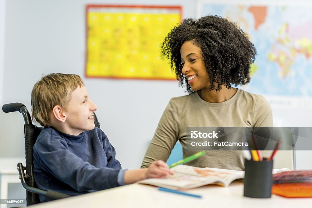 Developmental Disability Boy Boy With Developmental Disability Stock Photo - Download Image Now - 14 ...