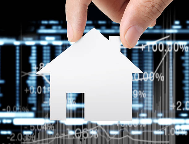 istock house of paper in hand 466595461