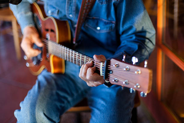 istock Old man playing blues on a guitar 466596195