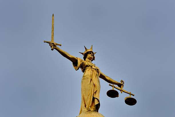 istock Justice statue on top of old bailey 466596876