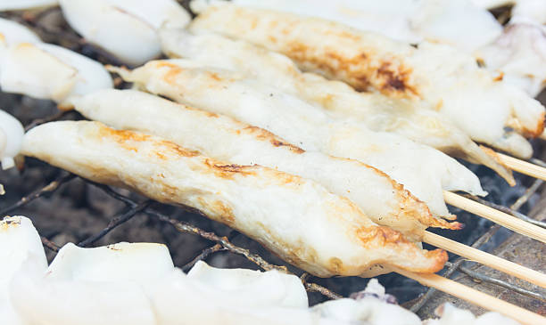 istock grilled squid eggs skewers - thai food 466596948