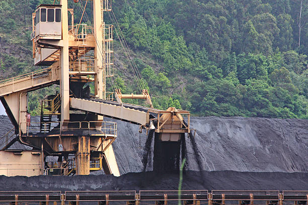 istock huge excavator of coal in a mine 466597965