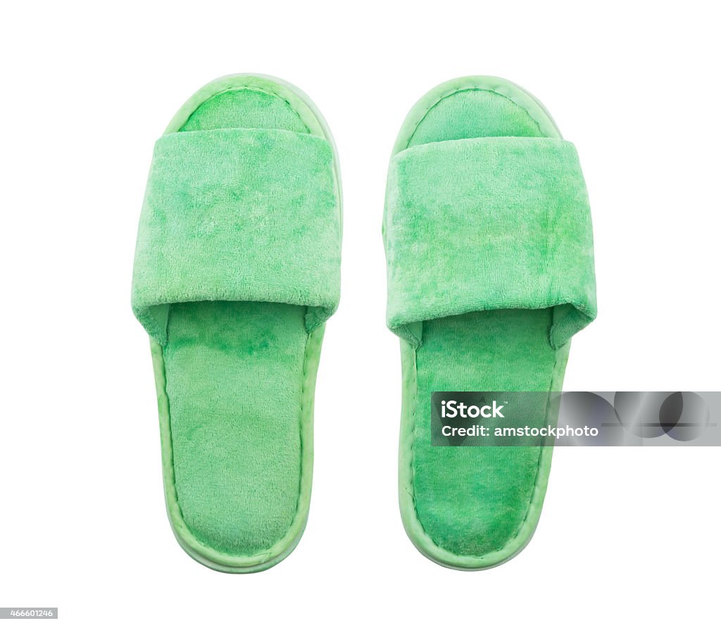 Green slippers Green slippers isolated on white background Slipper Stock Photo