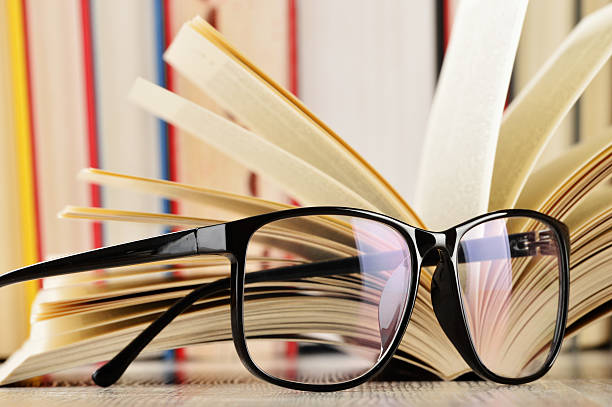istock Composition with glasses and books on the table 466603425