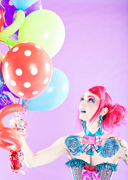istock Party Girl Holding Balloons 466609627