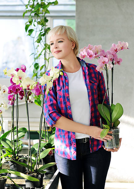 istock girl with orchids 466610995