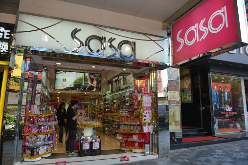 Hong Kong, China - December 9, 2014: In front of the Sasa Shop which is located on the Kowloon. Sasa is one of the top cosmetics shop in Hong Kong.