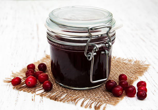 istock cranberry jam with fresh fruits 466612590