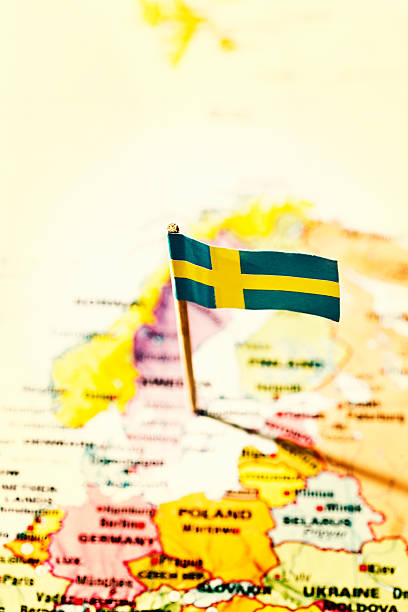 istock Swedish national flag stuck in map including Nordic countries 466614673