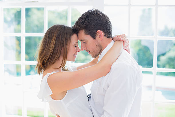 istock Loving young couple with arms around 466616440