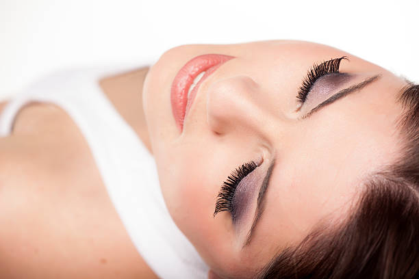 istock Close-up of a model laying down wearing false eyelashes 466616744