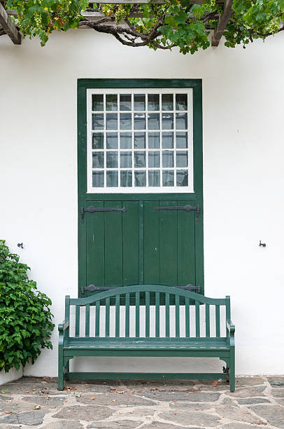 istock Bench and window at Drosdy in Swellendam 466619822
