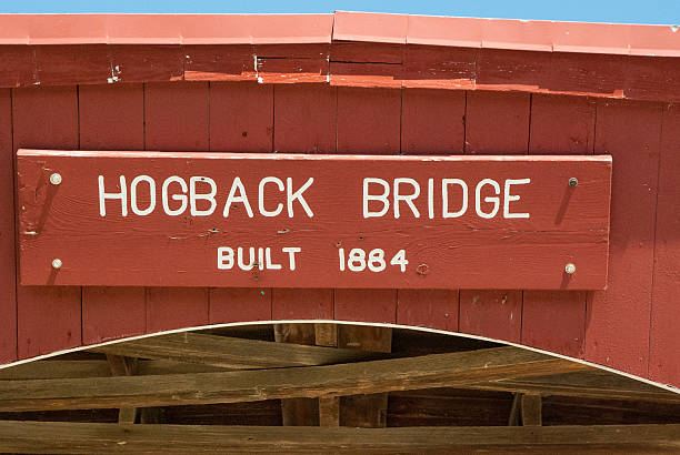 istock Closeup Hogback Covered Bridge Sign near Winterset Iowa 466622053