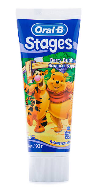 Oral B Toothpaste Ankara, Turkey - May 28, 2013: Oral-B is a brand of oral hygiene products, including toothbrushes, toothpastes, mouthwashes and dental floss. Oral B toothpastes and toothbrushes with designs featuring fun Disney characters that helps make brushing fun for children. winnie the pooh photos stock pictures, royalty-free photos & images