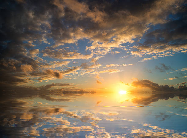 istock Stunning colorful Winter sunset sky reflected in still water 466623993