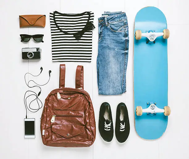 Photo of Overhead of essentials skater woman.