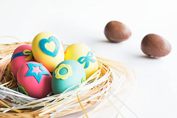 istock Easter eggs in a nest of paper 466626478