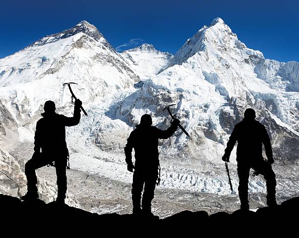 istock Silhouette of men with ice axe in hand, Mount Everest 466626822