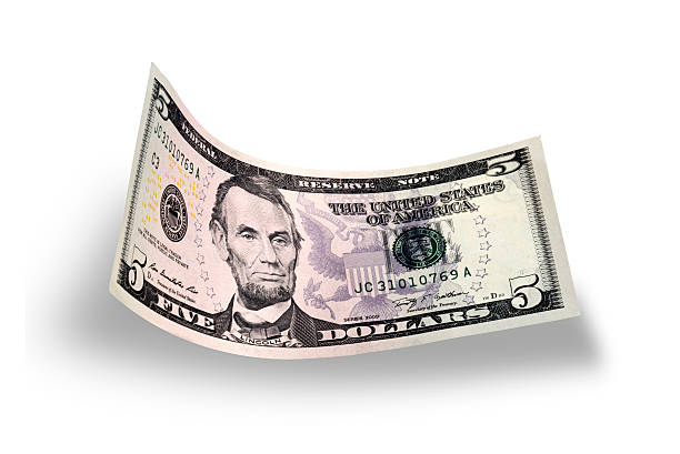 ricciolo cinque dollaro americano bill isolato su sfondo bianco - currency us paper currency five dollar bill usa foto e immagini stock