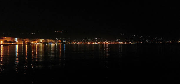 istock Nightscape with harbor and city lights 466631194