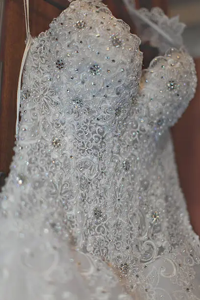 Wedding dress. Wedding dress with artificial pearls. Close up