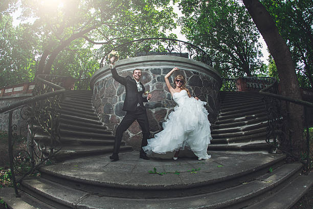 Wedding couple being funny on photo