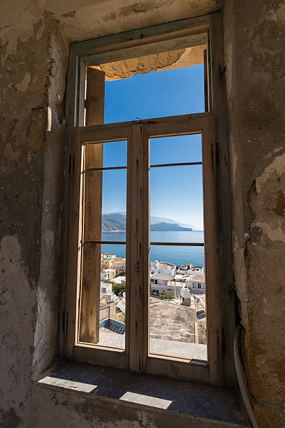 istock View through a ruined window on Palaiochora, Crete 466640392