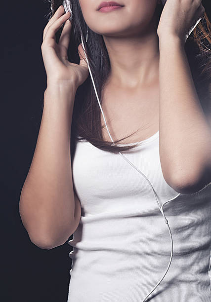 istock happy girl with headphones 466641014