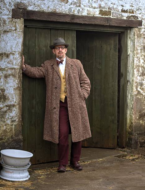 istock mature male with handlebar moustache leaning on wall 466644448