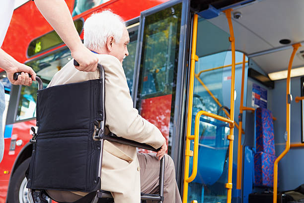 istock Senior Couple Boarding Bus Using Wheelchair Access Ramp 466646433