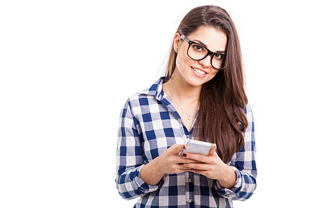 istock Happy girl texting on her phone 466648034