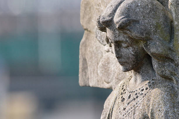 istock Beautiful stone angel with solemn regard 466648364