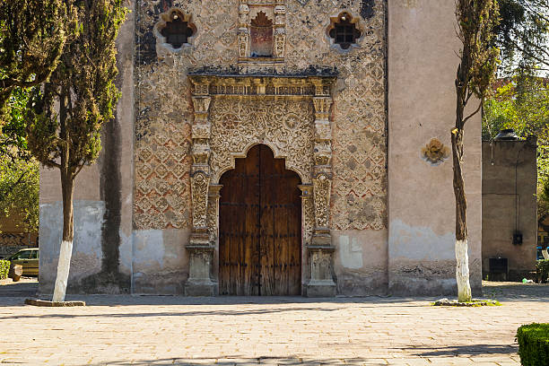 Facade detail of old colonial baroque church in mexico city. La conchita chapel in coyoacan