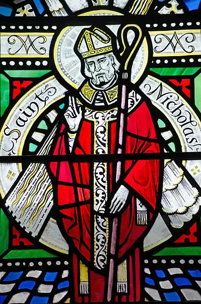 A Victorian stained glass window depicting Saint Nicholas.  Over 100 years old.