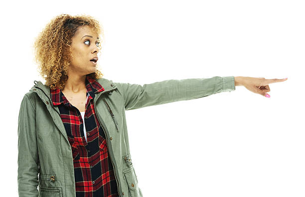 istock Shocked woman pointing away 466652538