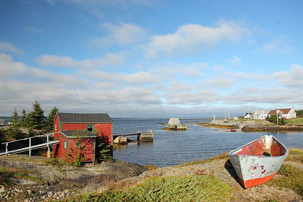 istock Building by the ocean and a boat 466652604