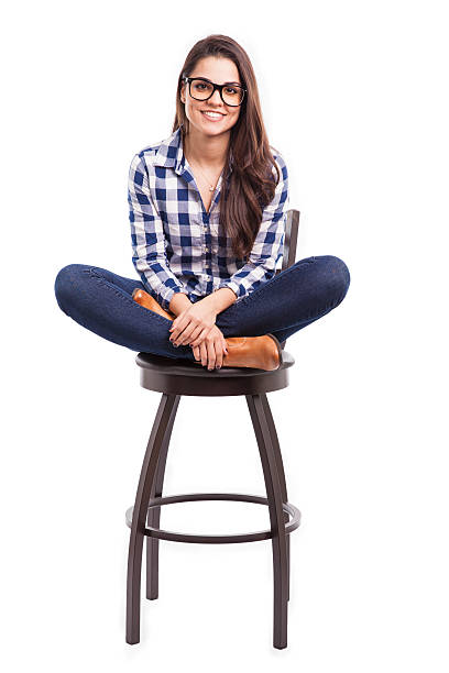 istock Hipster girl sitting on a chair 466655316